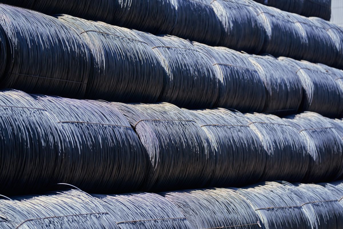 Stacked coils of steel wire rod at a mill